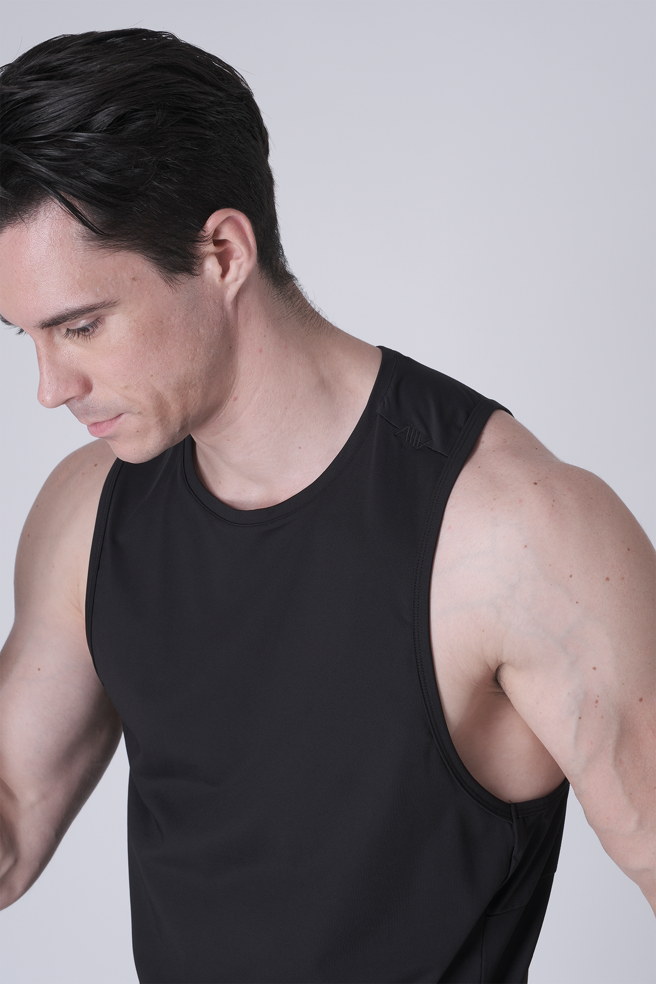 SPK0168 - Ultra 4-Way Stretch Nylon Training Tank - Black